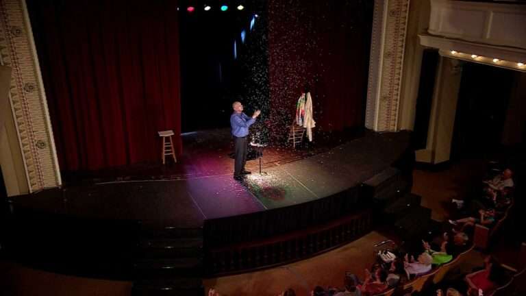 Magician performing on stage